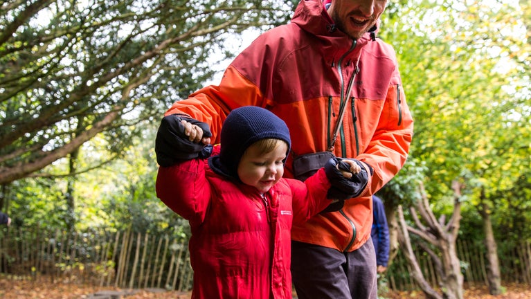Visitors playing in the play area at Nunnington Hall, North Yorkshire
